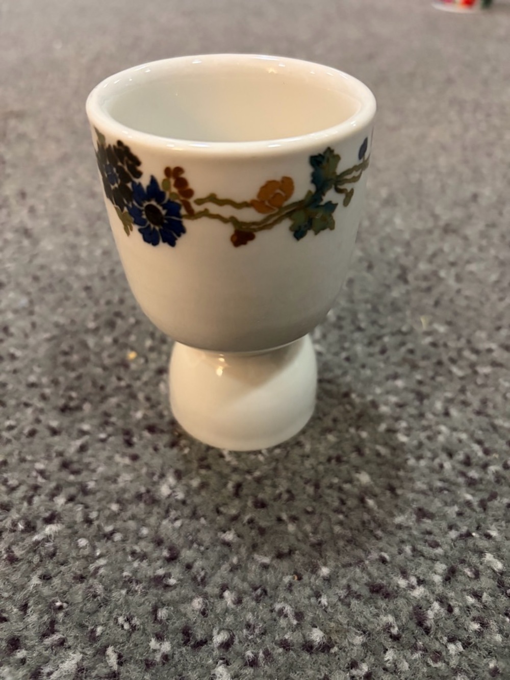 Delicate White Porcelain Egg Cup with Blue & Gold Floral Border